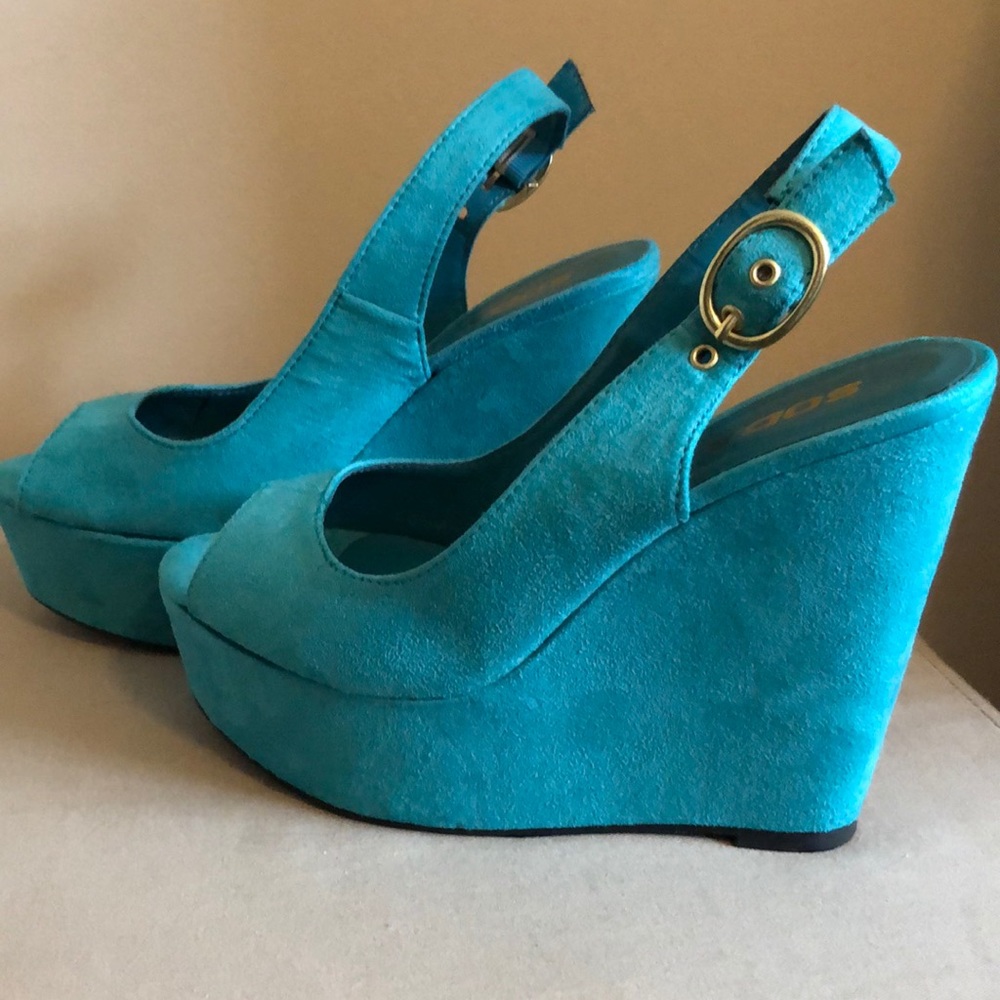 Soda brand teal heels.